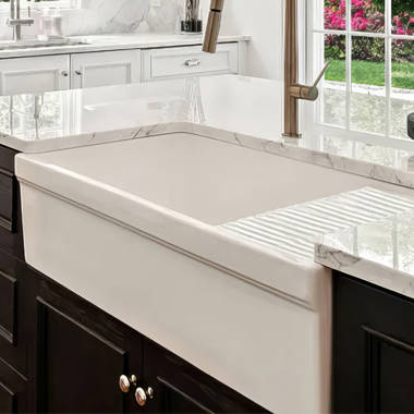 https://assets.wfcdn.com/im/33617486/resize-h380-w380%5Ecompr-r70/2633/263363310/Fireclay+Reversible+Sink+with+Integral+Drainboard+and+Decorative+2+%C2%BD%22+Lip+on+Both+Sides.jpg