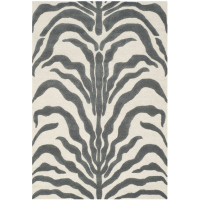 Carevelle Animal Print Wool Hand Woven Area Rug