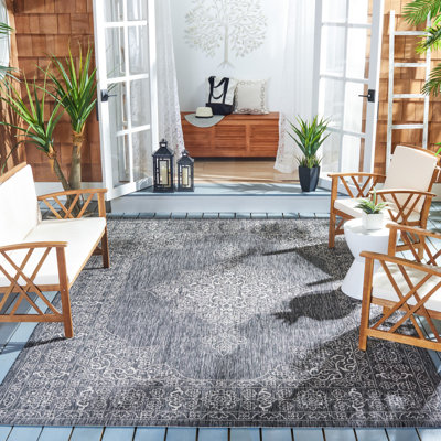 Arneshia Floral Brown/Tan Indoor/Outdoor Area Rug