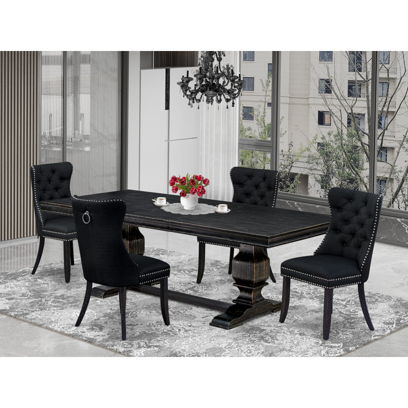 Cet ensemble de cuisine 5 pièces comprend une table de petit-déjeuner et 4 chaises parsons en tissu de polyester noir avec dossier capitonné à boutons - finition noire sablée.
