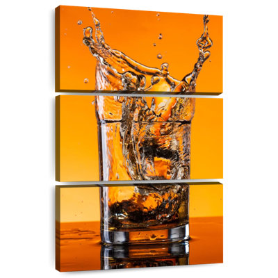 Whiskey Splashing In Glass