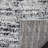 Riebe Abstract Black/Silver Area Rug-22408809