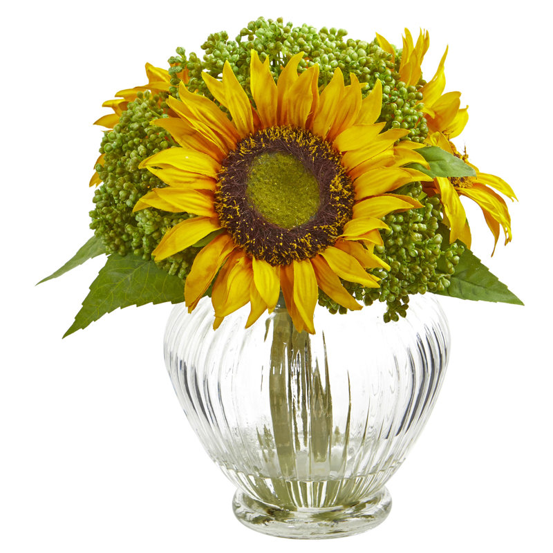 Arrangement floral artificiel à tournesol dans un vase en verre