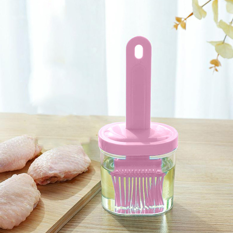 Bouteille d'eau, une brosse à huile et une brosse à huile, Rose