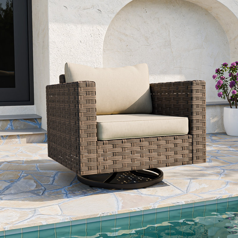 Fauteuil oscillant pivotant avec coussins Wicker