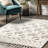Akia Lattice High/Low Tassel Area Rug-1683627290