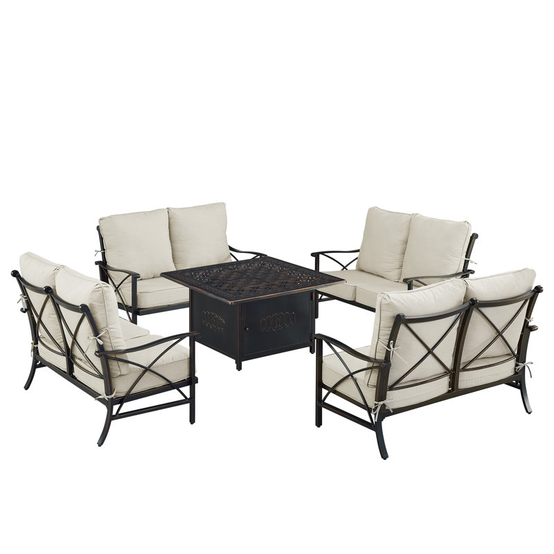 Ensemble de table de foyer en aluminium noir avec quatre causeuses profondes