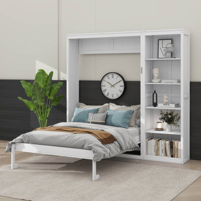 Grand lit caché pour plus d'espace avec tablettes de rangement