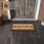 Tapis noir Welcome-108218727