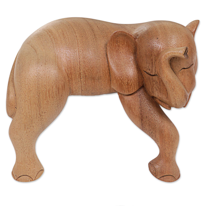 Figurine éléphant faisant la sieste