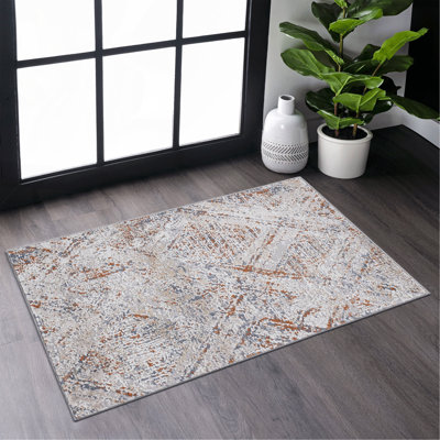 Tapis beige / géométrique