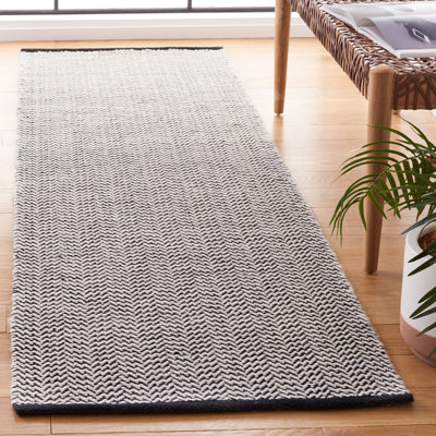 Tapis géométrique noir / ivoire en coton tissé à la main Vermont