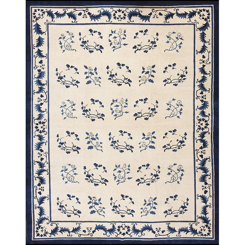Tapis chinois à motif floral antique ivoire et bleu