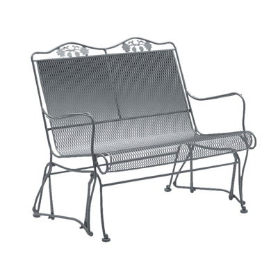 Fauteuil oscillant à haut dossier