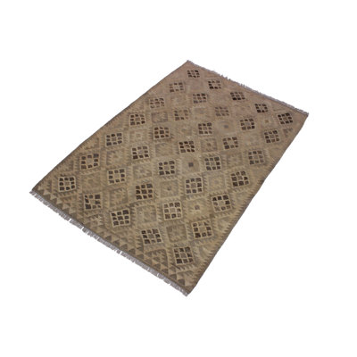 Madee Geometric Handmade Rectangle 4'6" x 6'7" Wool Area Rug in Brown/Dark Brown