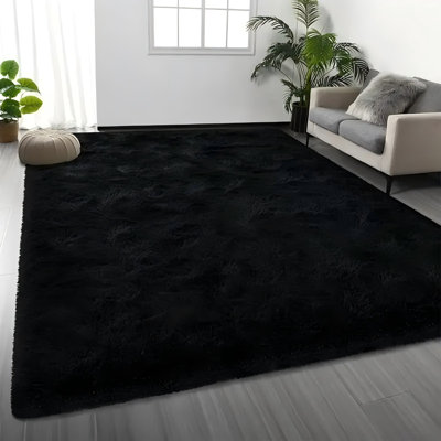 Soft black shag area rug