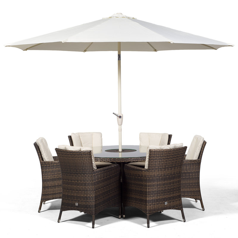 Karcher 6 - Person Wicker Patio Dining Set with Round Table , Cushions Included, Brown