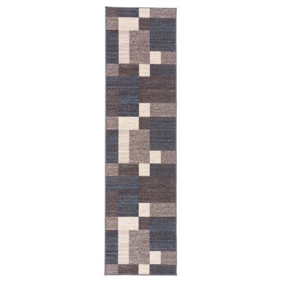 Tapis bleu touffeté à motif géométrique Allyne