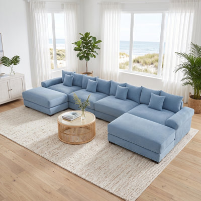 Canapé d'angle modulaire surdimensionné en velours côtelé, assise profonde avec larges accoudoirs rembourrés, bleu, 4 places, 2 poufs