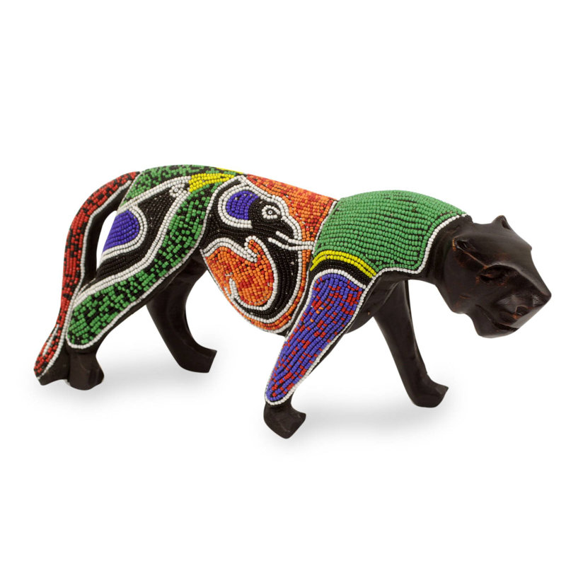 Figurine panthère avec éléphant et oiseau