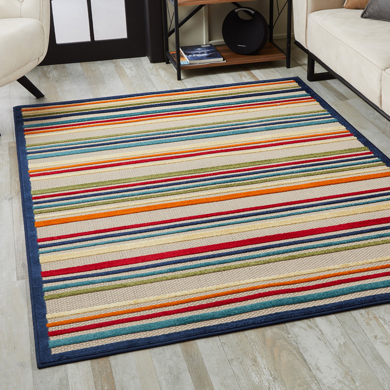 Tapis intérieur / extérieur rayé bleu et ivoire 2 pi x 4 pi résistant aux taches