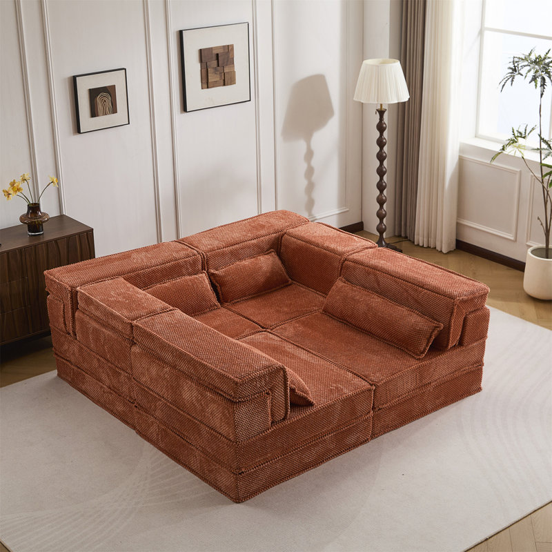 Canapé-lit convertible au sol avec conception modulaire, mousse à mémoire de forme haute densité et tissu polaire circulaire moelleux pour un confort et une flexibilité ultimes.