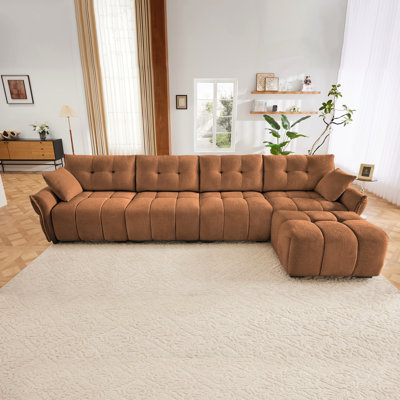 Canapé modulaire capitonné en L en chenille avec repose-pieds et coussins Holdan