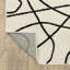 Tapis beige / noir Colesen-116003373