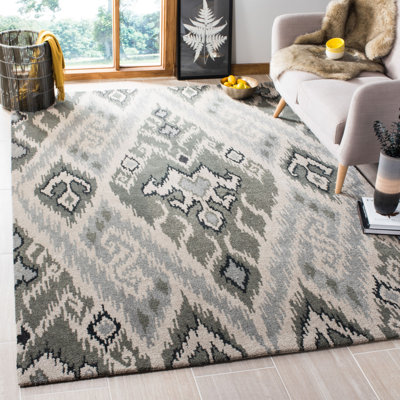 Tapis gris en laine touffeté à la main