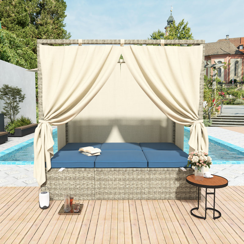 Lit de jour d'extérieur en osier avec auvent et coussins bleu foncé, meubles de patio avec sièges réglables