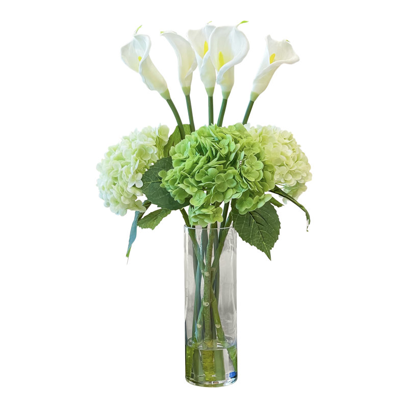 Pièce maîtresse Calla Lily dans un grand vase en verre