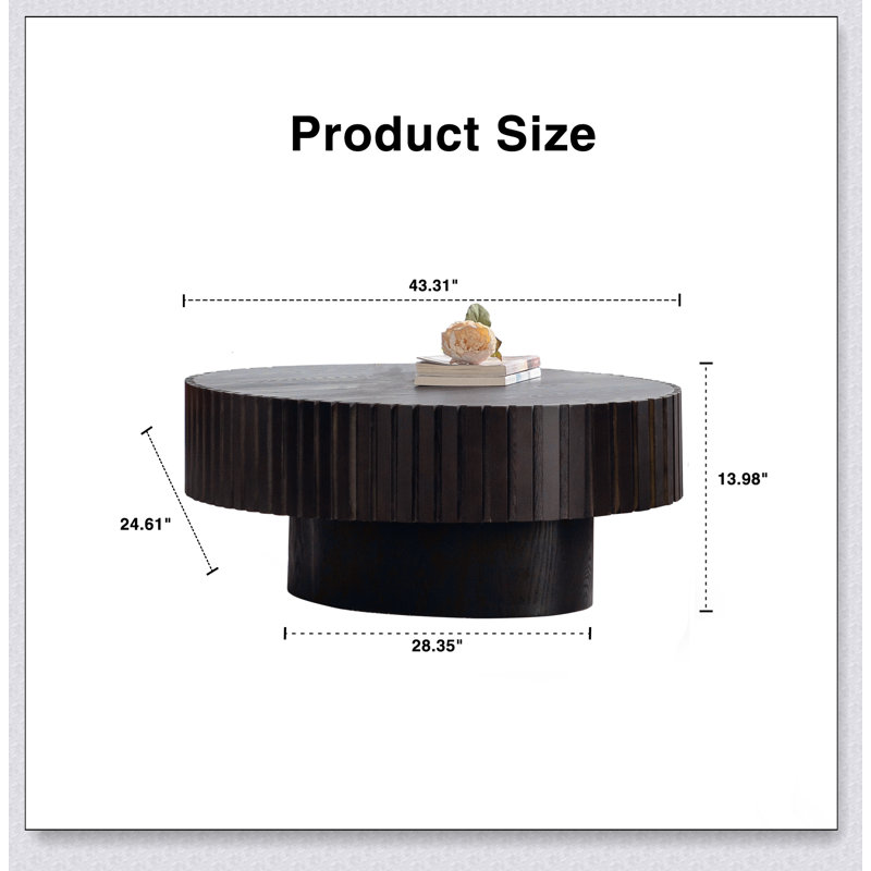 Table basse ovale avec relief fabriqué à la main et piédestal robuste, parfaite pour les salons modernes et traditionnels
