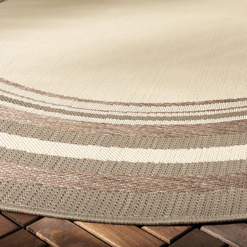 Carold Performance Solid Color Indoor/Outdoor Area Rug, Round 5'3"