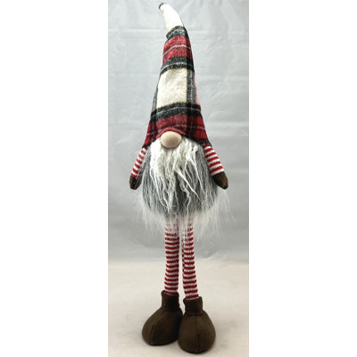 Figurine gnome debout avec de longues pattes portant un chapeau écossais tartan