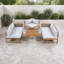 Méridiennes de patio en bois avec chaise d'angle, table et coussins-133244491