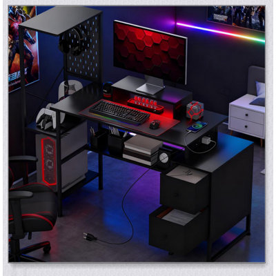 Ergonomic Gaming Desk with Storage, Power Outlets, and RGB LED Lights for Home and Office Use