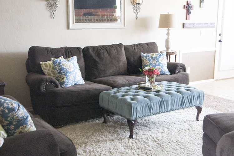 living room with gray sofa