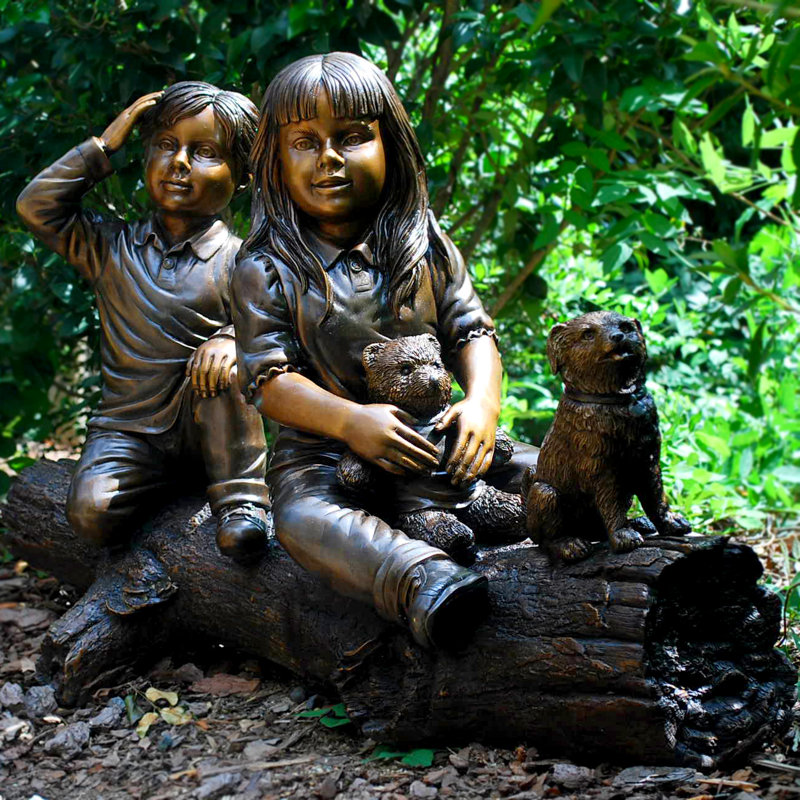 Sculpture bronze enfants et chien sur une bûche