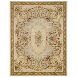 Evelyn Hand Tufted Wool Oriental Area Rug in Ivory