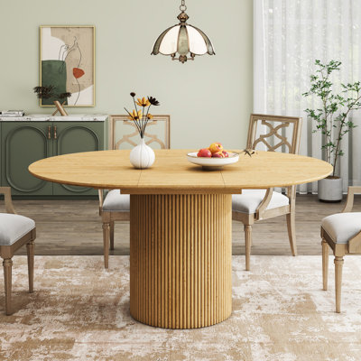 47-62" Solid Wood Round Extendable Dining Table
