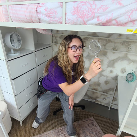Girl searching for school supplies at The Wayfair Store.