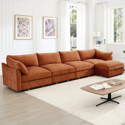 Canapé modulaire en L 4 places en chenille orange avec croissant, coussins enveloppants et tiroirs de rangement escamotables en L