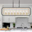 Lustre linéaire industriel en laiton noir et doré à 8 lumières pour salle à manger