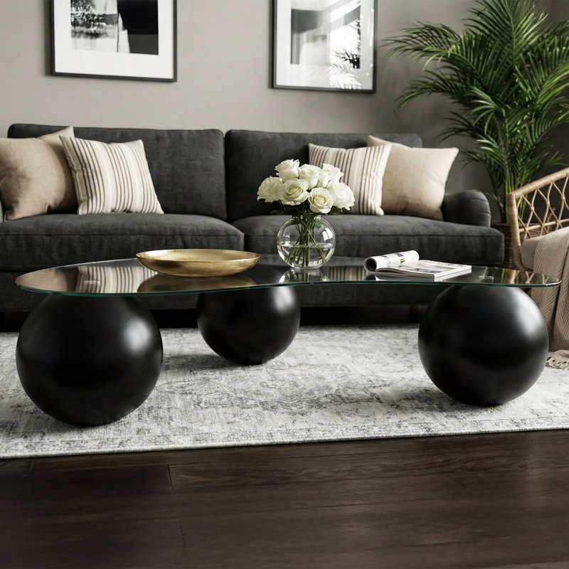 Bean Shaped Glass Top Coffee Table with Sculptural Ball Base for Modern Living Rooms, Black