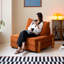 Coussin orange modulaire en velours côtelé