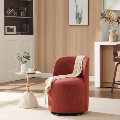 Fauteuil rond en lin de style Mid-Century Modern, pivotant à 360°, revêtement givré doux et piètement moderne. Structure en métal.