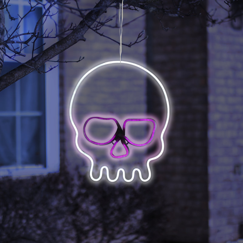 Décoration néon en forme de tête de mort en forme de tube blanc avec yeux mauves