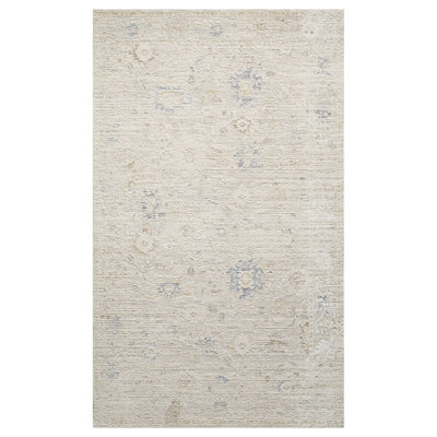 Tapis d'intérieur tissé à la machine en filigrane floral beige / ivoire Melby