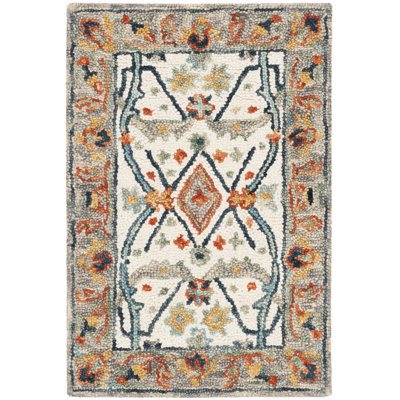 Vahakn Hand Tufted Wool/Cotton Rug in Blue/Ivory