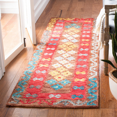Hand Tufted Wool/Cotton/Latex Oriental Rug in Red/Brown